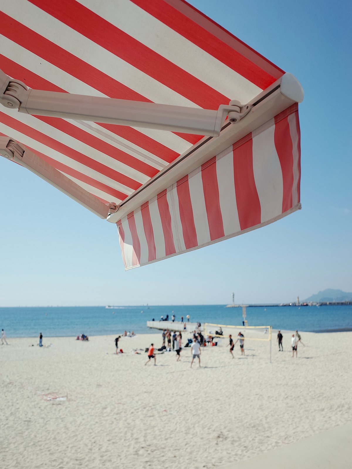 Striped beach awning on the Cote d'Azur — vibrant colour print