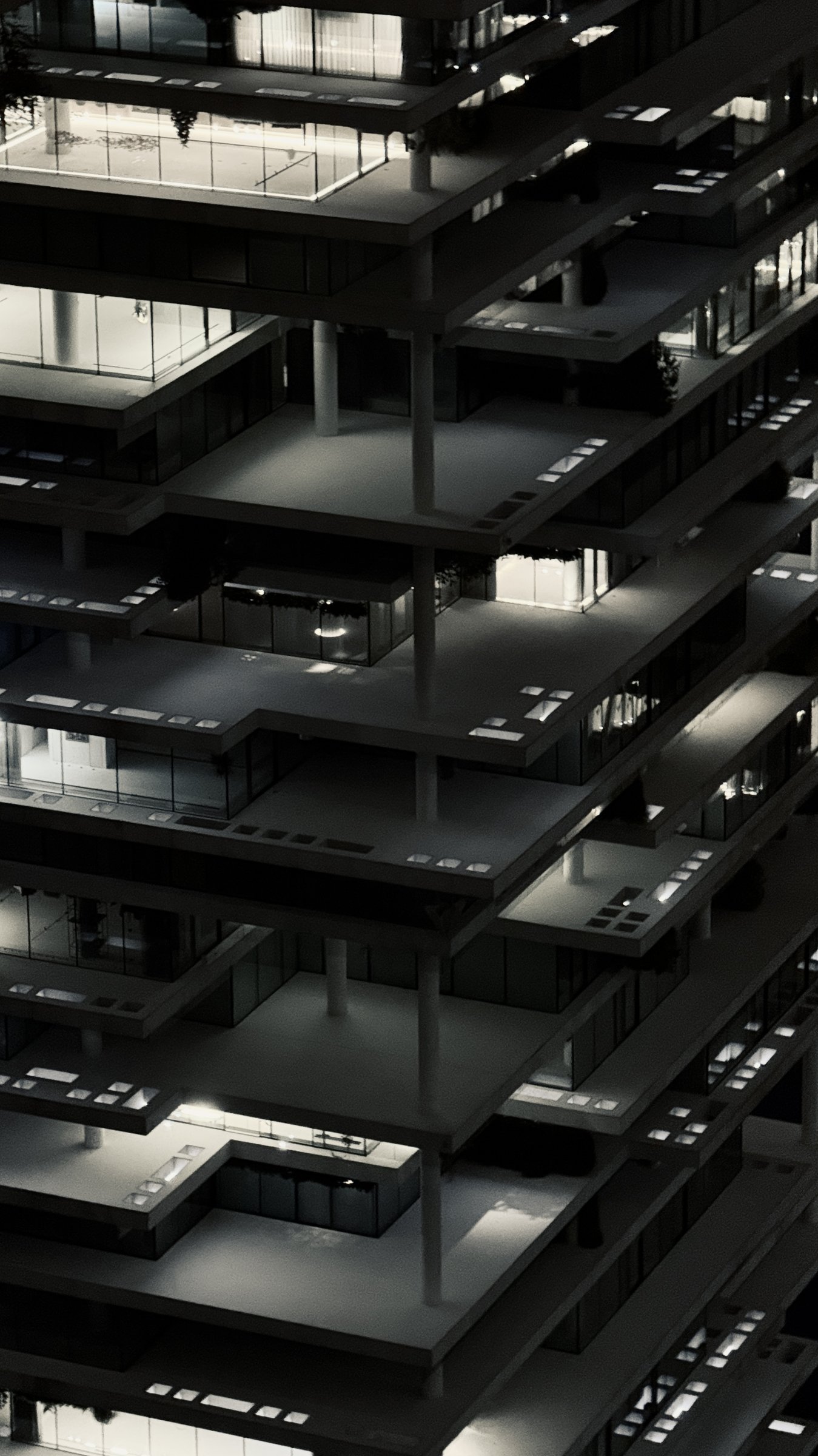 Beirut residential tower at night — balconies in shadow